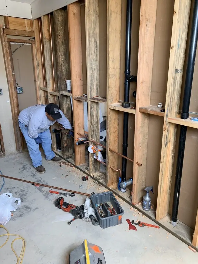 Commercial rough-in plumbing for Water Heater Replacement in Big Woods Acres
